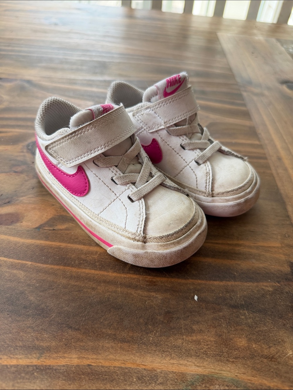 Nike Kids White Sneakers with Pink Swoosh
